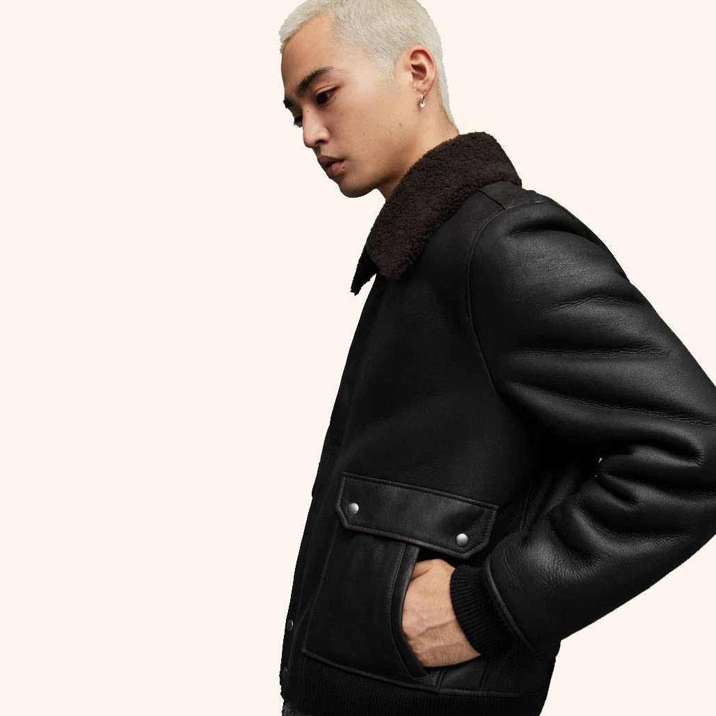 Men's Black Leather Harrington Shearling Bomber Jacket with front zipper and shearling accents.