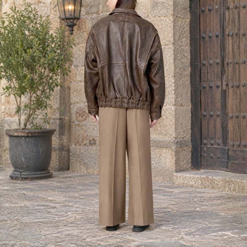 Minimalist women's brown zip-up jacket with gathered hem