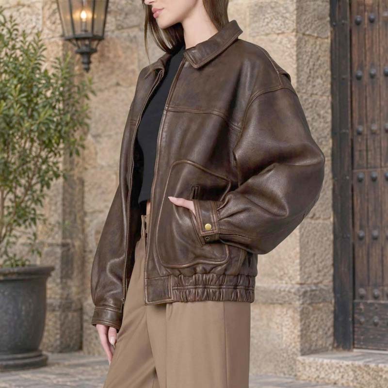 Women's dark chocolate brown leather-look bomber jacket with vintage styling