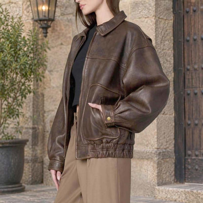 Women's dark chocolate brown leather-look bomber jacket with vintage styling