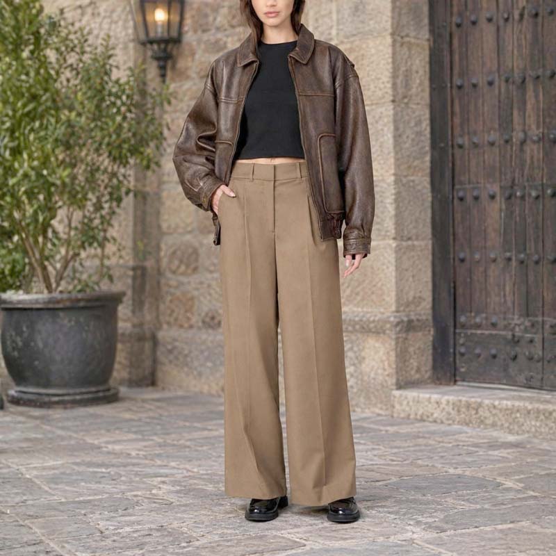 Women's brown retro bomber jacket with button-detail cuffs