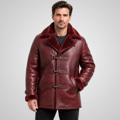Burgundy leather shearling coat with buckle-front closure