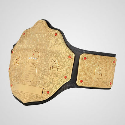 Gold plated Big Gold wrestling championship belt with red jewels