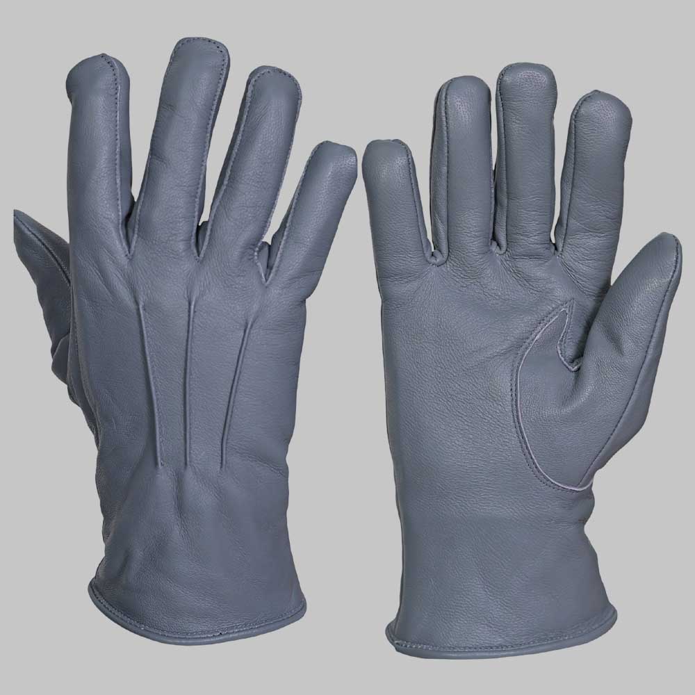 Luxury grey leather glove stitching and leather texture closeup
