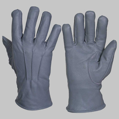 Luxury grey leather glove stitching and leather texture closeup