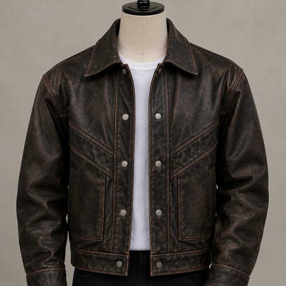 Men's dark brown vintage Western trucker jacket with distressed leather-look finish.