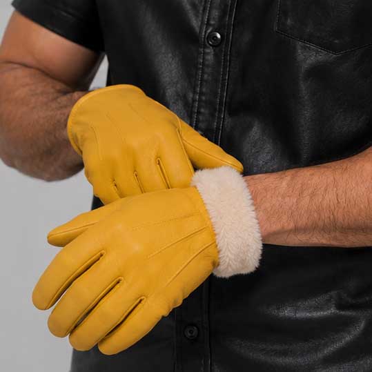 Genuine yellow winter leather glove designed for riding and outdoor wear