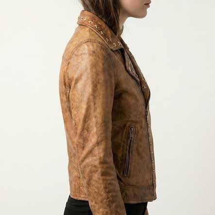 Handmade cognac biker coat featuring silver hardware and star stud detail