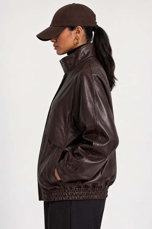 Women's oversized brown leather flight jacket with high-neck collar